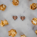 Hand drawn laser cut and engraved baseball/softball heart wood studs. Great for sensitive ears! 13mm x 14mm Material: