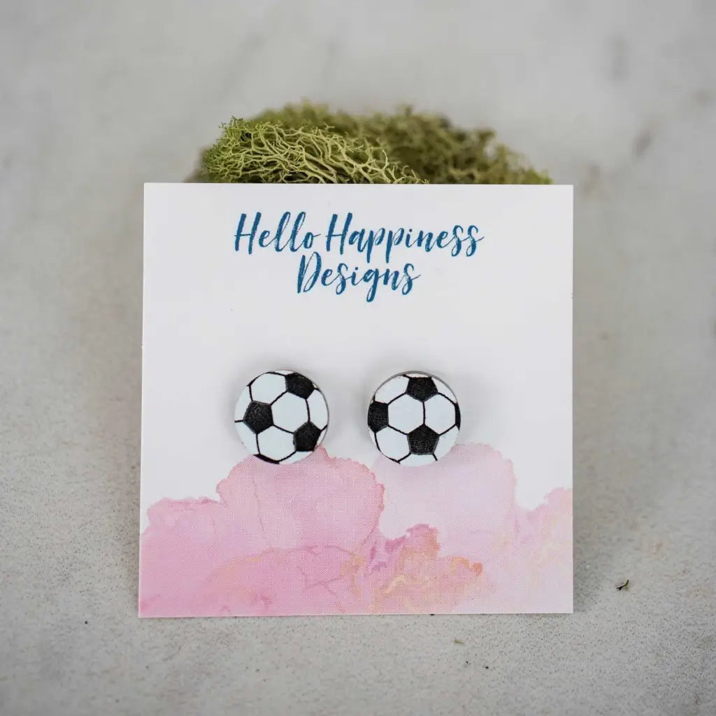 Hand drawn laser cut and engraved soccer acrylic studs. Great for sensitive ears! 14mm Material: Specialty