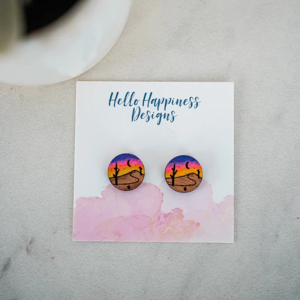 Hand drawn laser cut and engraved desert scene wood studs. painted. Great for sensitive ears! 15mmMaterial: