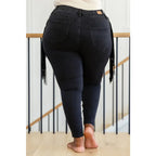 Rock the look in our Hilary Side Fringe Black Skinny Jeggings by Judy Blue! These stretchy denim jeggings feature a mid