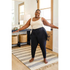 Rock the look in our Hilary Side Fringe Black Skinny Jeggings by Judy Blue! These stretchy denim jeggings feature a mid