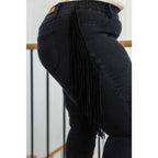 Rock the look in our Hilary Side Fringe Black Skinny Jeggings by Judy Blue! These stretchy denim jeggings feature a mid