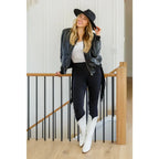 Rock the look in our Hilary Side Fringe Black Skinny Jeggings by Judy Blue! These stretchy denim jeggings feature a mid