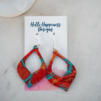 Medium copper patina cutout teardrop dangle earrings. 2 inch length. Great for sensitive ears! Material: Printed MDF