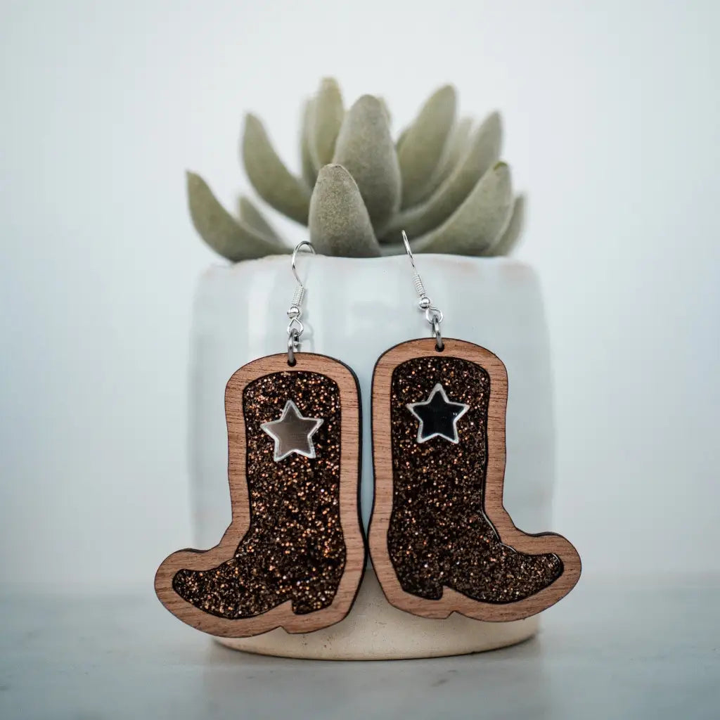 2 inch length Features 3 dimensional star detail Great for sensitive ears Material: Sapele Glitter Acrylic or Patterned