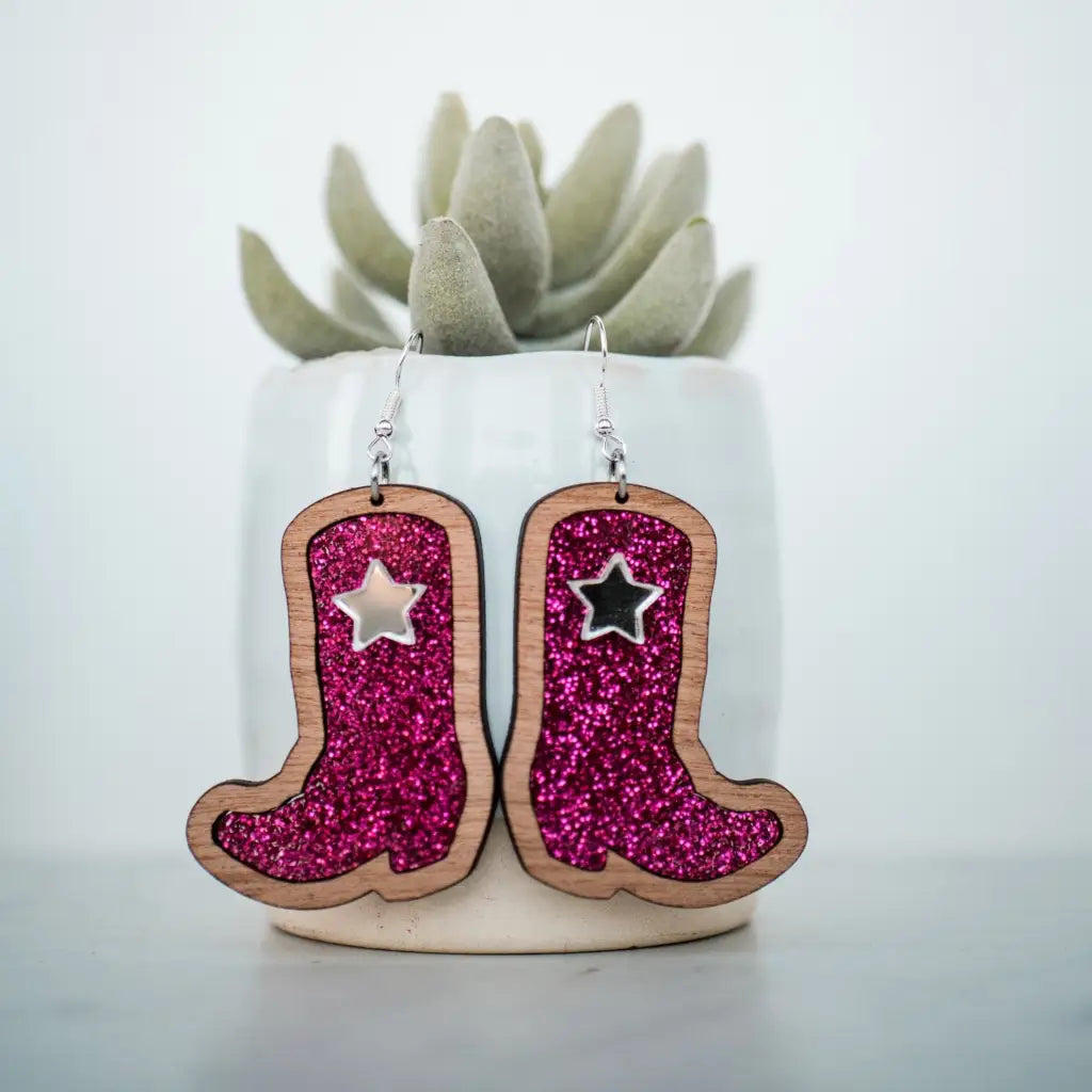 2 inch length Features 3 dimensional star detail Great for sensitive ears Material: Sapele Glitter Acrylic or Patterned