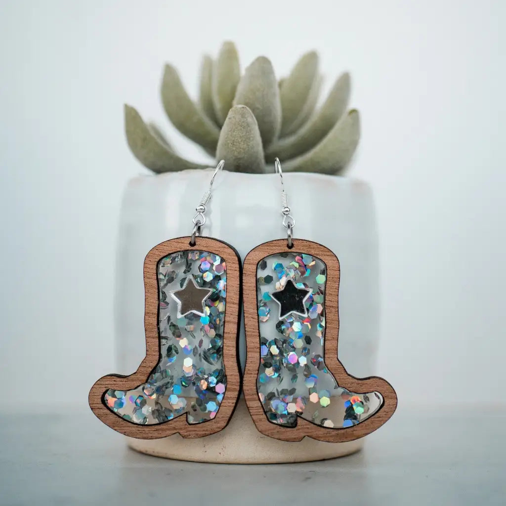 2 inch length Features 3 dimensional star detail Great for sensitive ears Material: Sapele Glitter Acrylic or Patterned