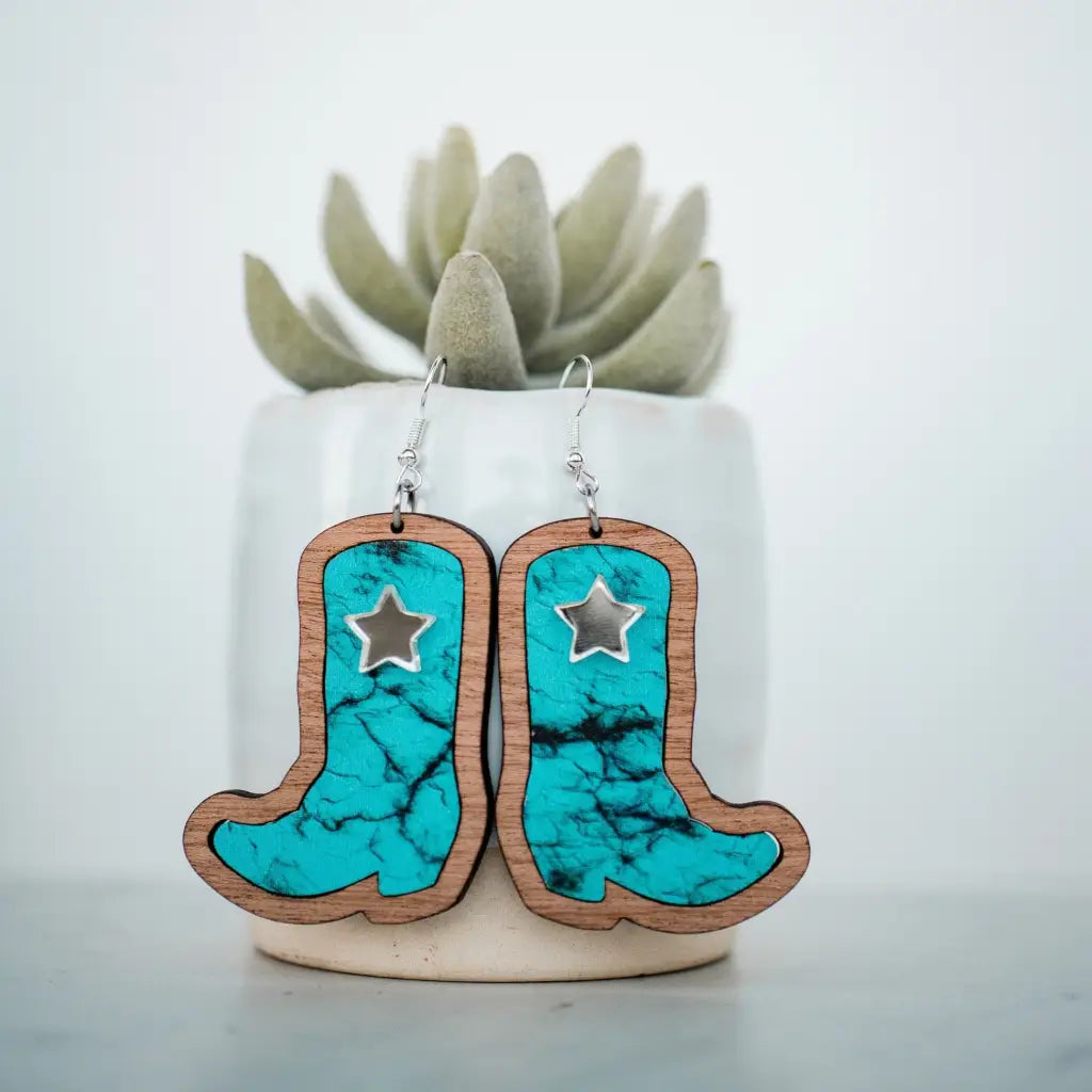 2 inch length Features 3 dimensional star detail Great for sensitive ears Material: Sapele Glitter Acrylic or Patterned