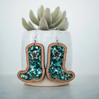 2 inch length Features 3 dimensional star detail Great for sensitive ears Material: Sapele Glitter Acrylic or Patterned