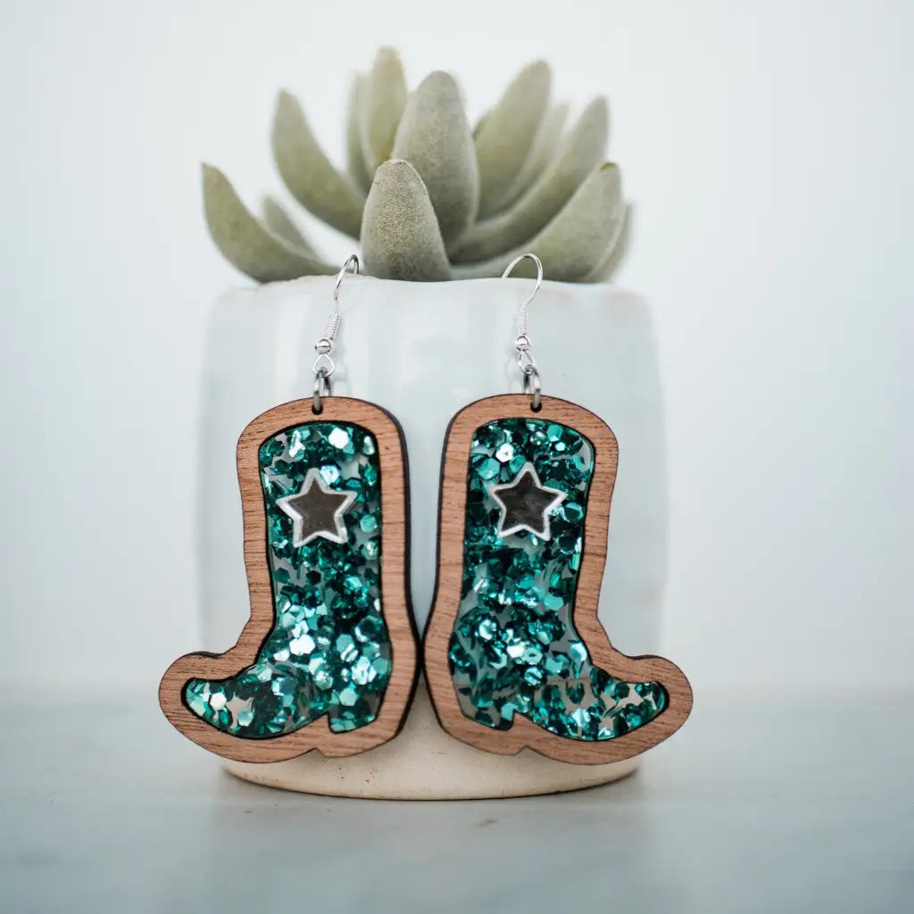 2 inch length Features 3 dimensional star detail Great for sensitive ears Material: Sapele Glitter Acrylic or Patterned