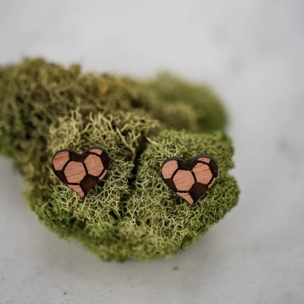 Hand drawn laser cut and engraved soccer heart wood studs. Great for sensitive ears! 13mm x 14mm Material: