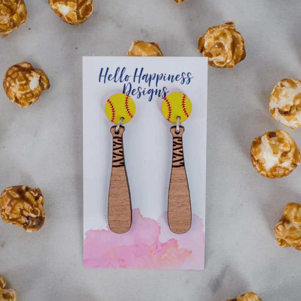 Softball and bat drop acrylic wood dangle earrings. 2.3 inch length. Great for sensitive ears! Material: Specialty