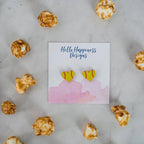 Hand drawn laser cut and engraved yellow red softball heart acrylic studs. Great for sensitive ears! 13mm x 14mm