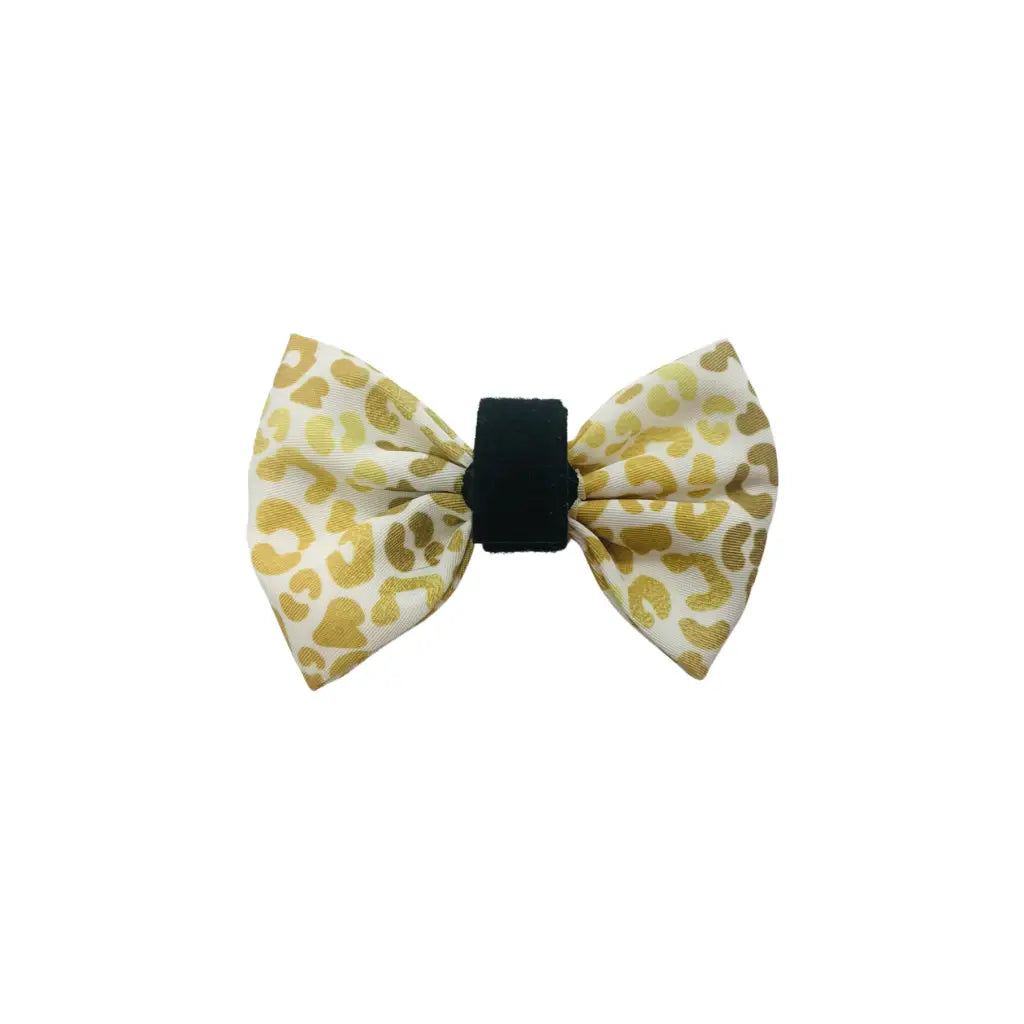 Add some extra style and flare with this classy bow tie Secures in the back a velcro strap to go over your pet’s collar