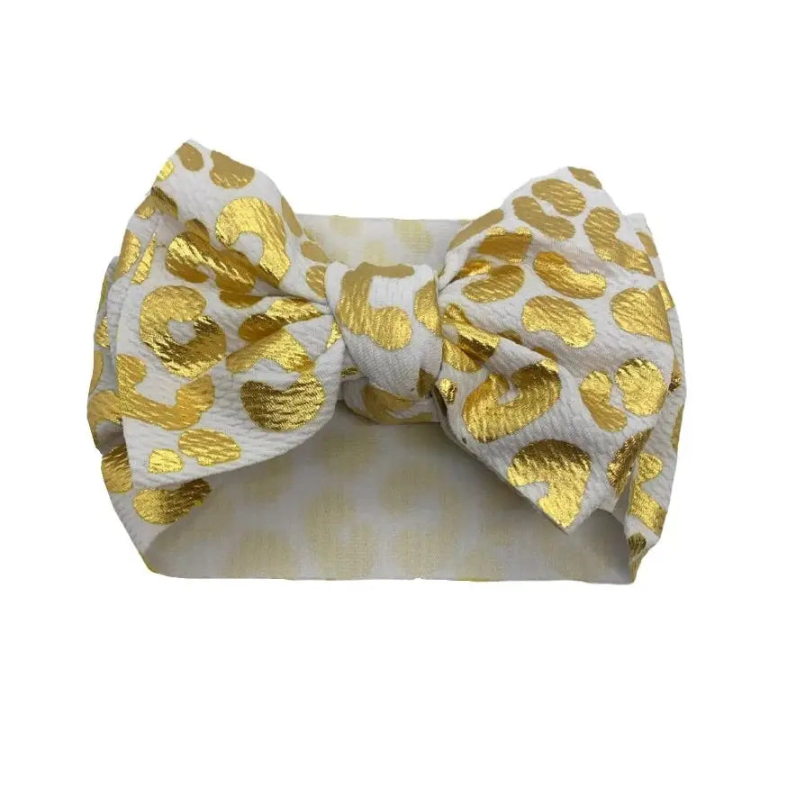 This glamorous metallic cheetah printed doggie head bow is the perfect accessory to make your pup’s outfit extra!